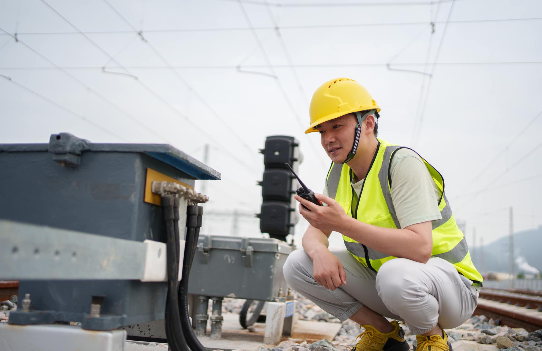 Engineer testing railway signal lights